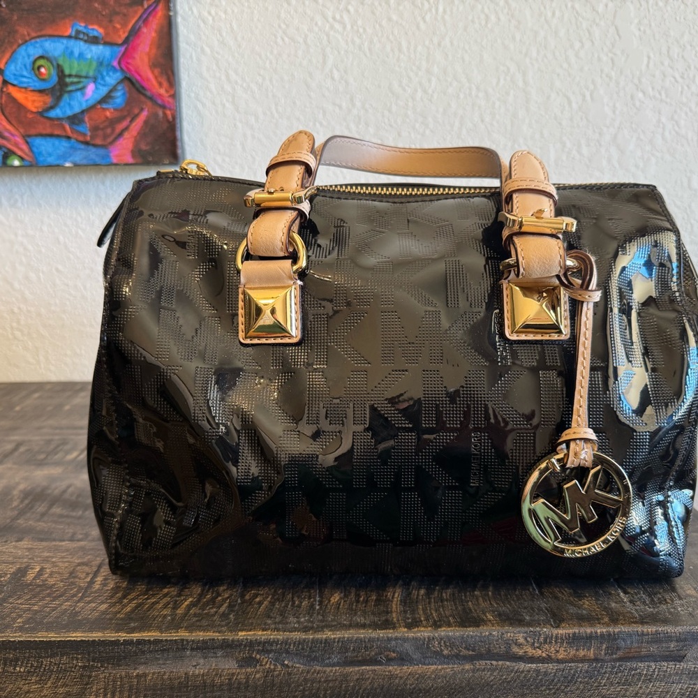 Michael Kors Black and Gold Satchel with Classic Barrel Shape